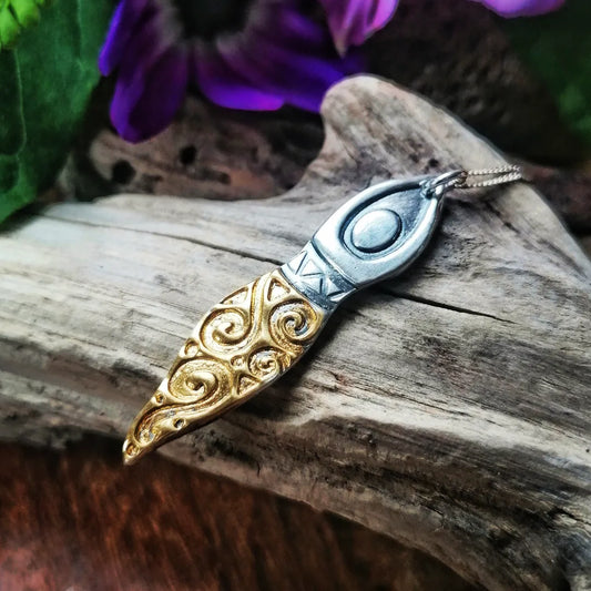 Selkie gold and silver pendant